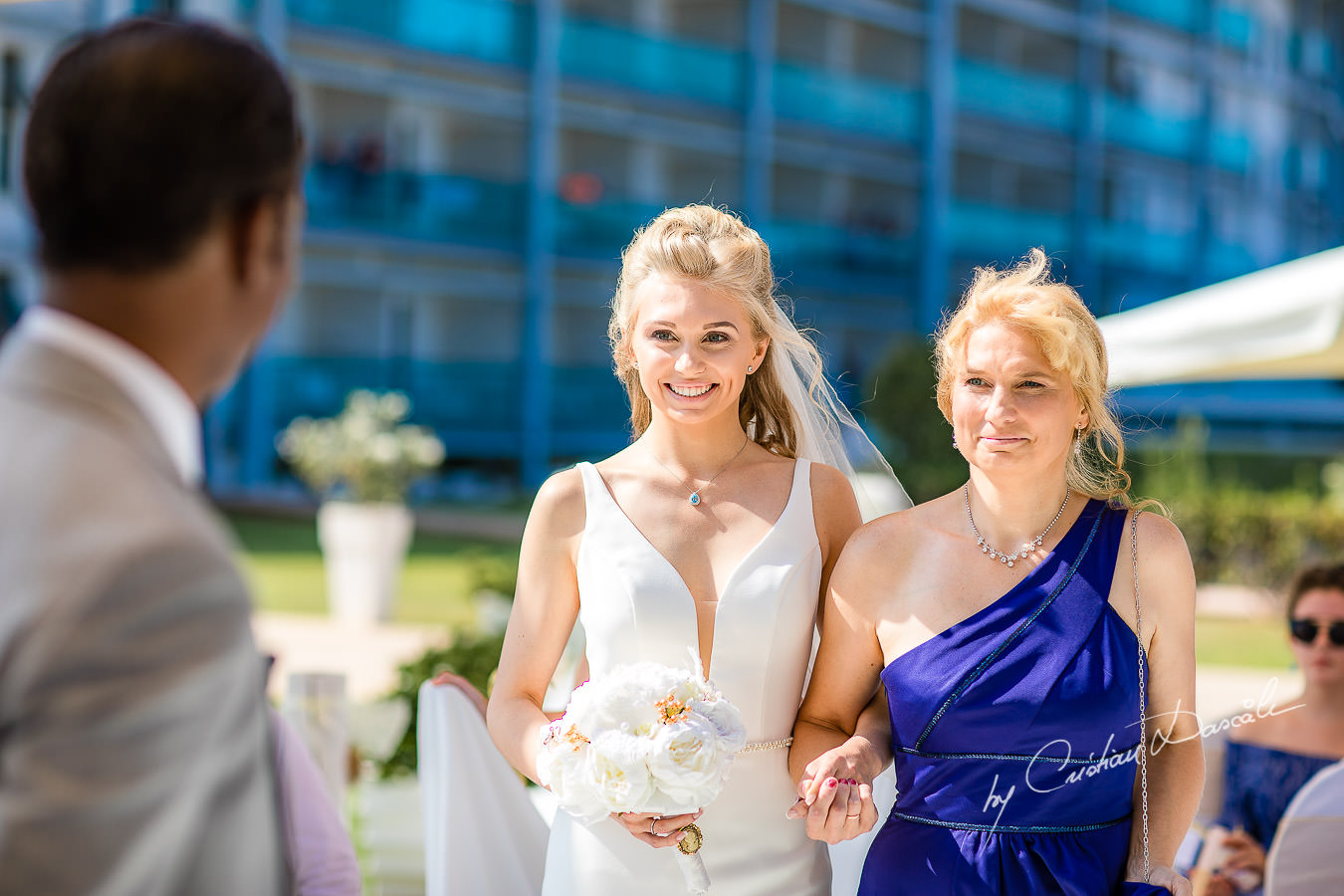 Bride arrival at an Exquisite Wedding at Asterias Beach Hotel. Photography by Cyprus Photographer Cristian Dascalu.