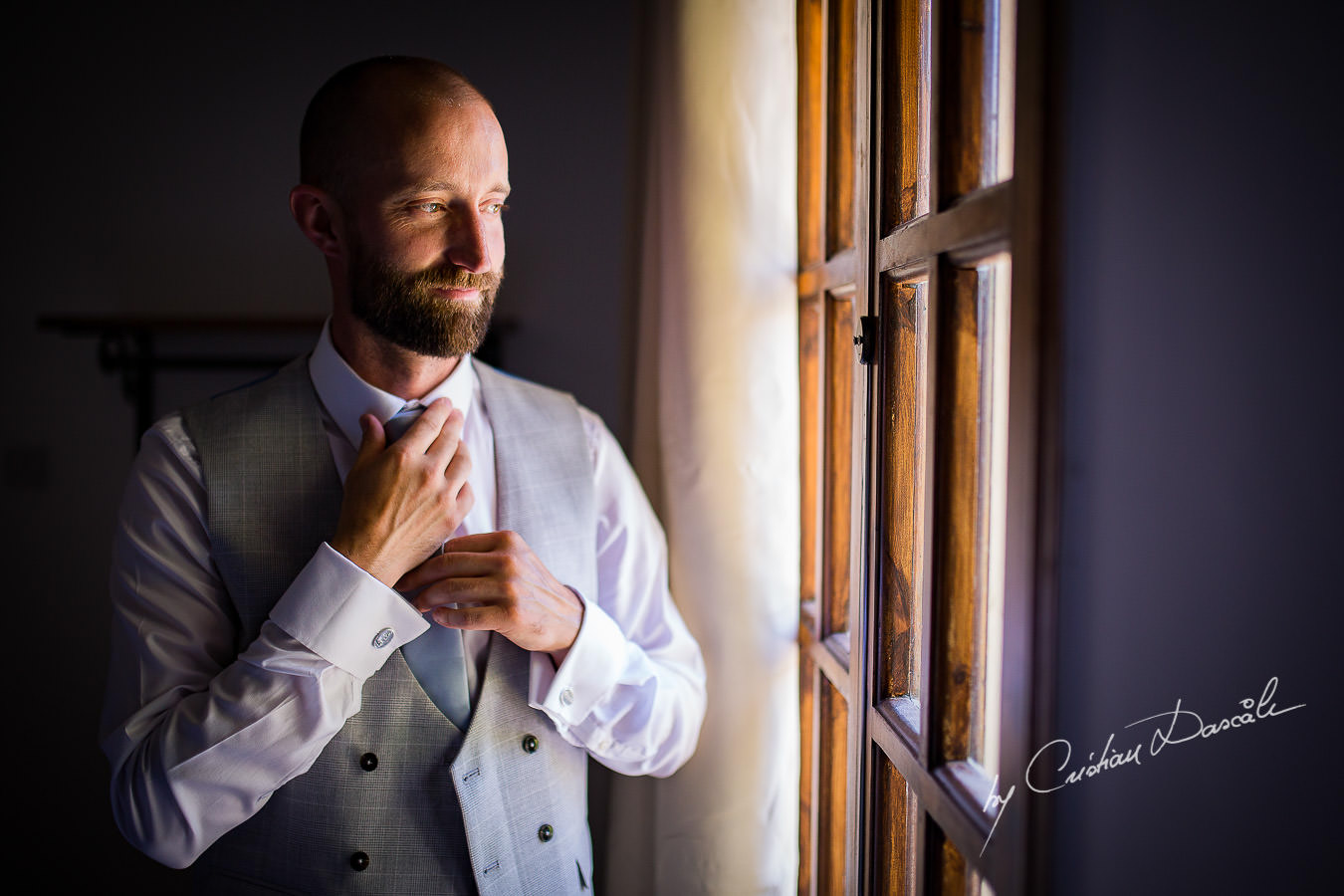 Groom portraiture captured at a Vasilias Nikoklis Inn Wedding in Paphos. Cyprus Wedding Photography by Cristian Dascalu.