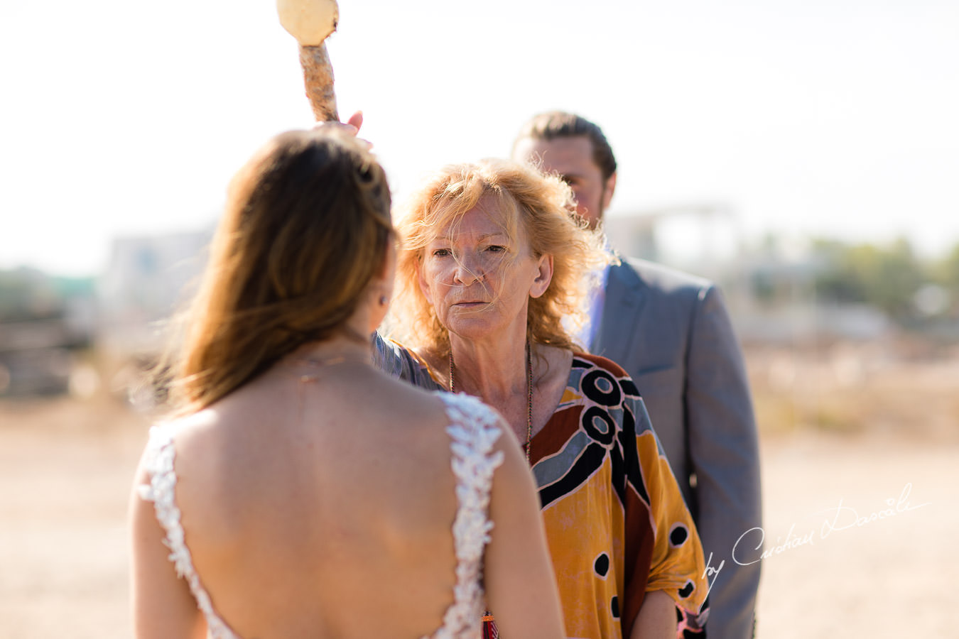 The shaman blessing the bride, moments captured by Cyprus Wedding Photographer Cristian Dascalu.