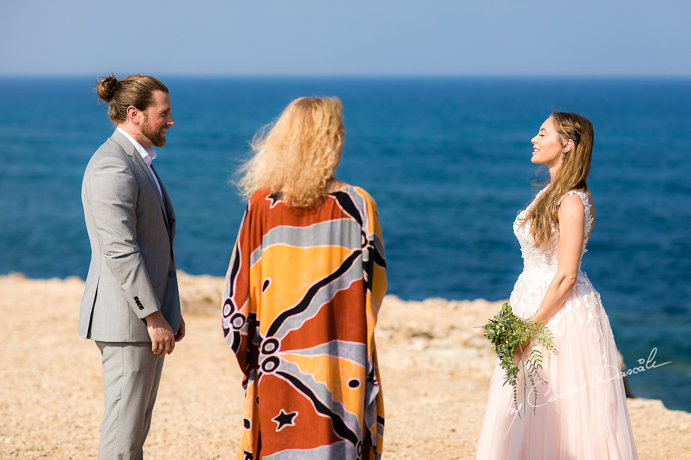 The shaman blessing the bride, moments captured by Cyprus Wedding Photographer Cristian Dascalu.