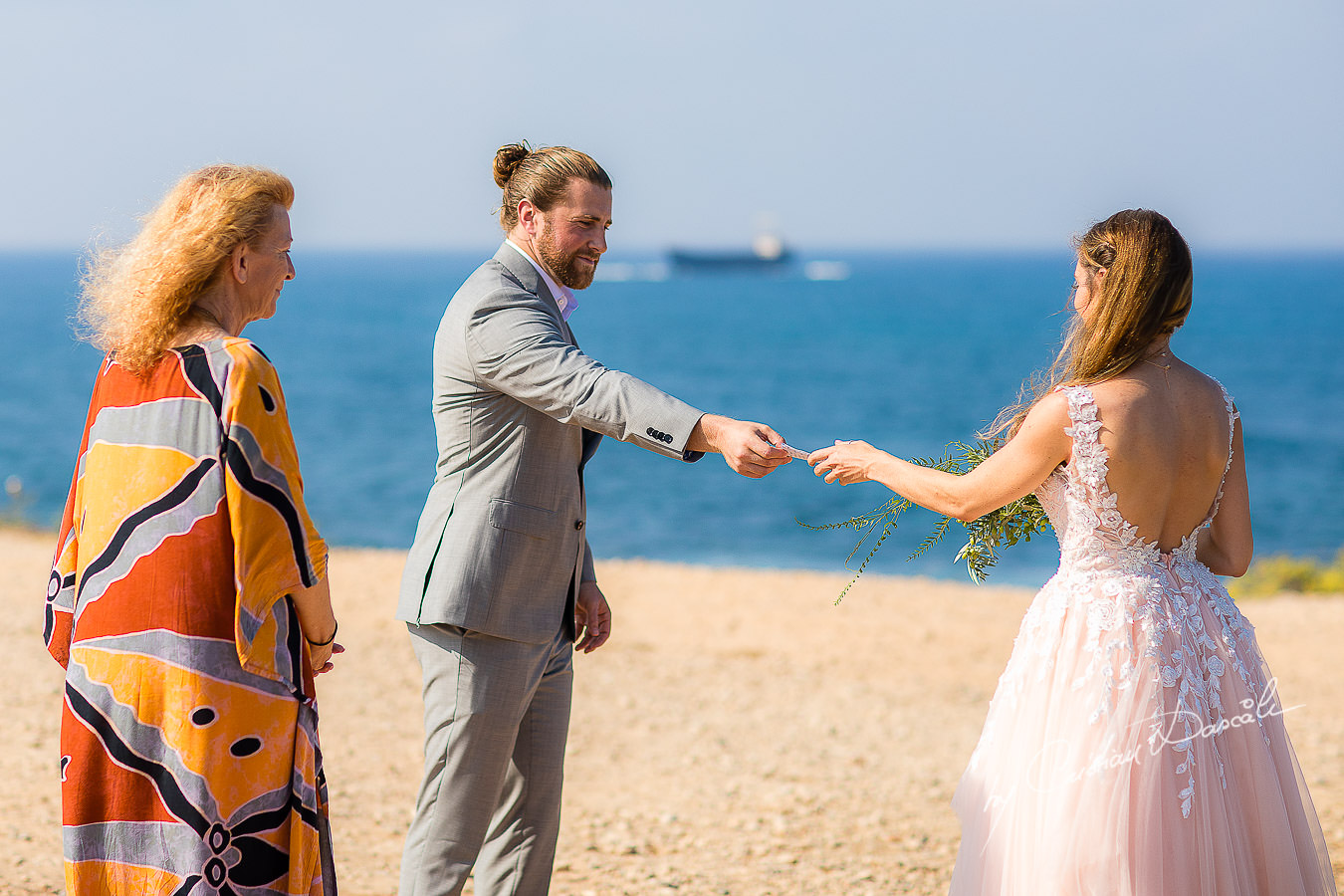 The bride and groom changing vows, moments captured by Cyprus Wedding Photographer Cristian Dascalu.