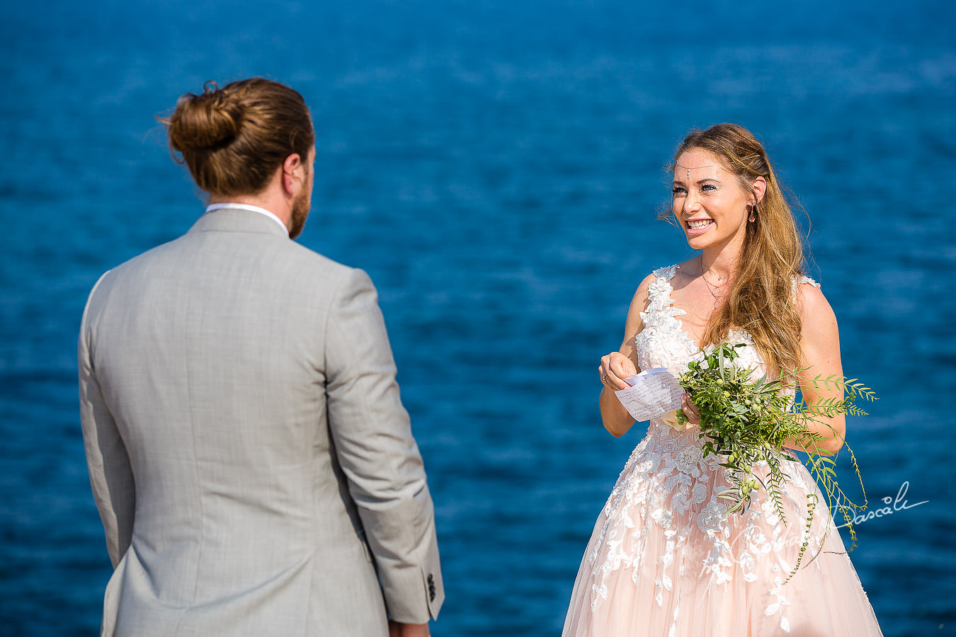 The bride and groom changing vows, moments captured by Cyprus Wedding Photographer Cristian Dascalu.