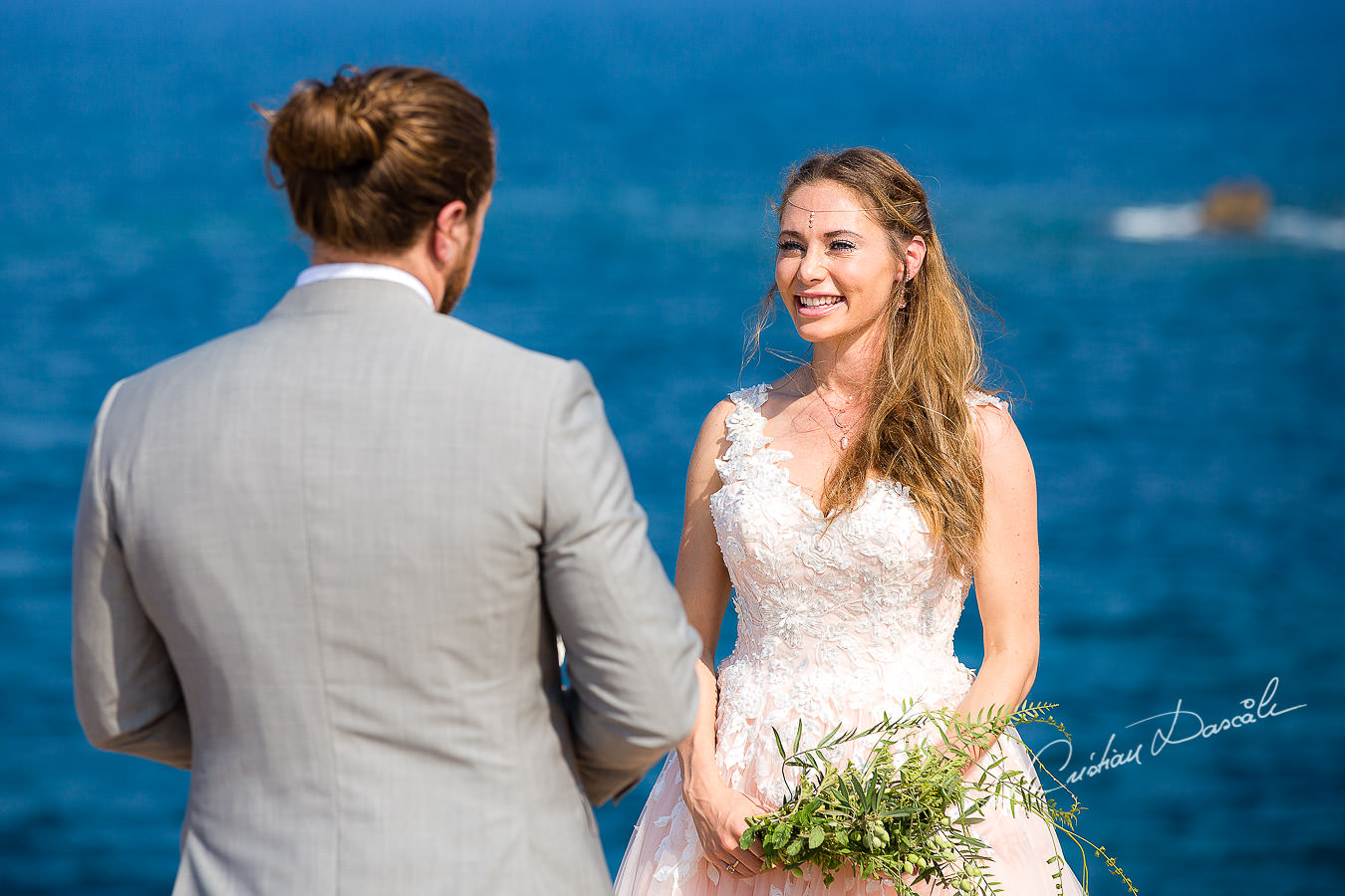 The bride and groom changing vows, moments captured by Cyprus Wedding Photographer Cristian Dascalu.