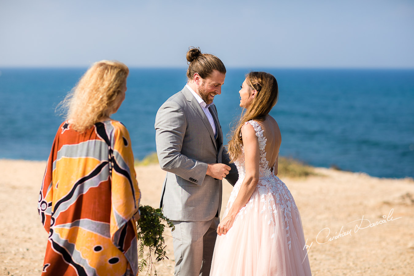 The bride and groom changing vows, moments captured by Cyprus Wedding Photographer Cristian Dascalu.