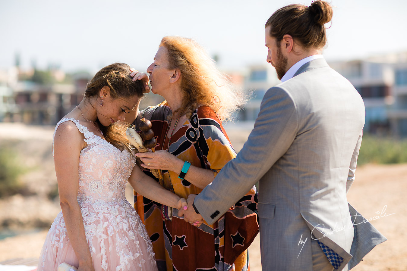 The shaman blessing the bride, moments captured at a Shamanic Wedding Ceremony by Cyprus Wedding Photographer Cristian Dascalu.