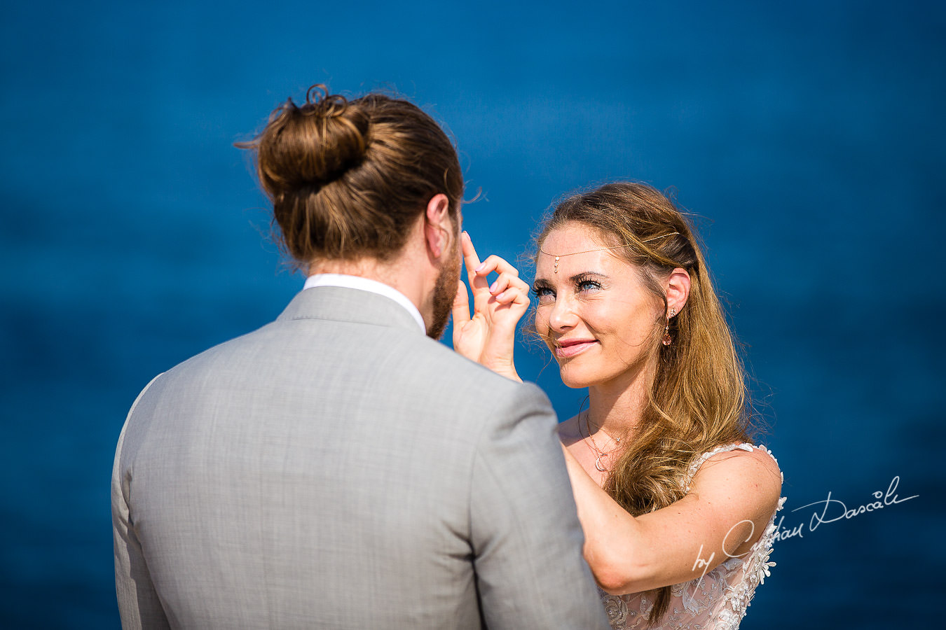 Bride and groom changing vows, moments captured at a Shamanic Wedding Ceremony by Cyprus Wedding Photographer Cristian Dascalu.