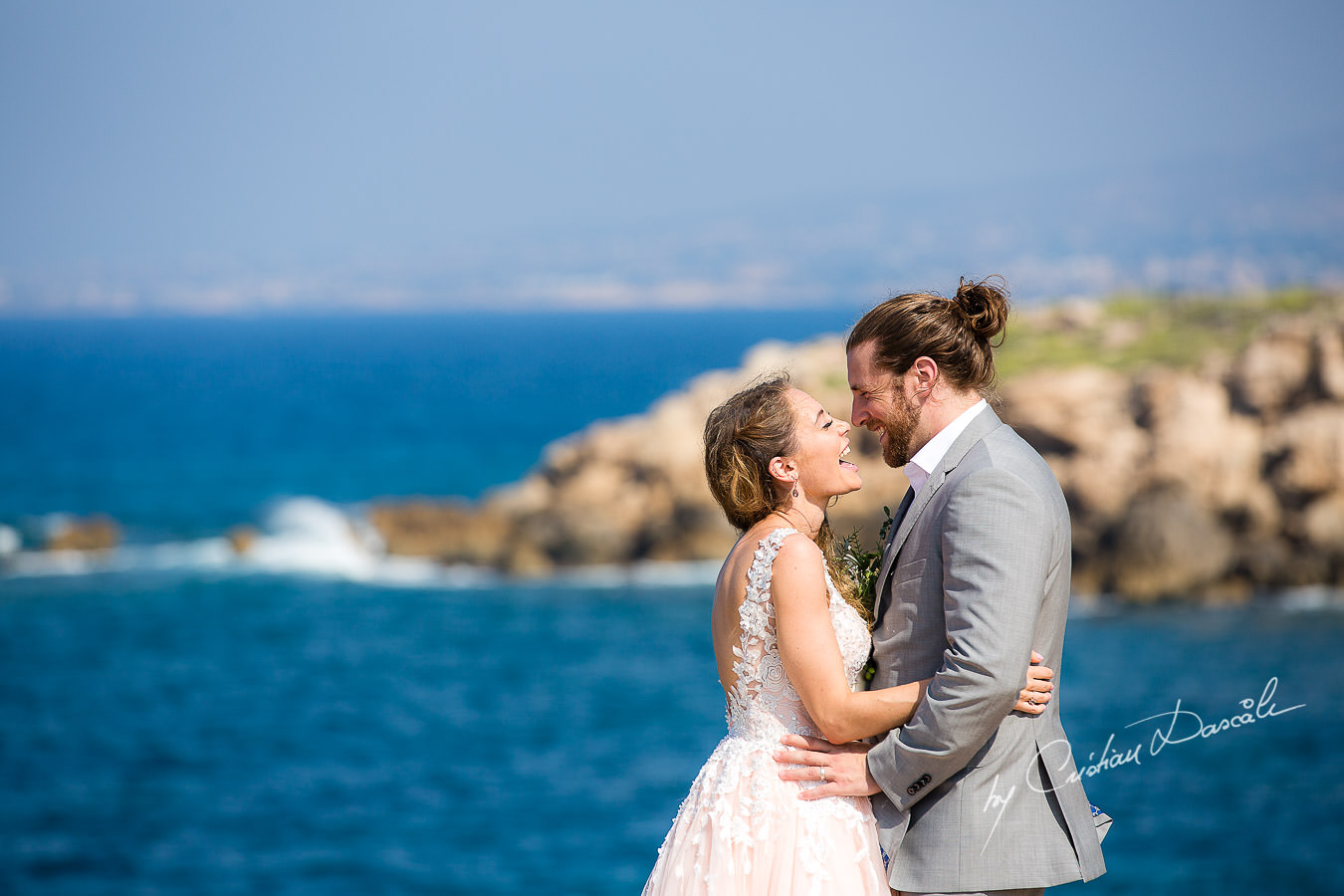 Bride and groom posing on the beach, moments captured at a Shamanic Wedding Ceremony by Cyprus Wedding Photographer Cristian Dascalu.