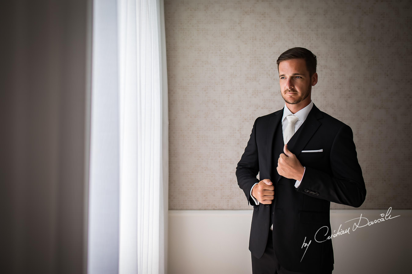 Stylish groom portraiture captured by Cristian Dascalu during an elegant Aphrodite Hills Wedding in Cyprus.