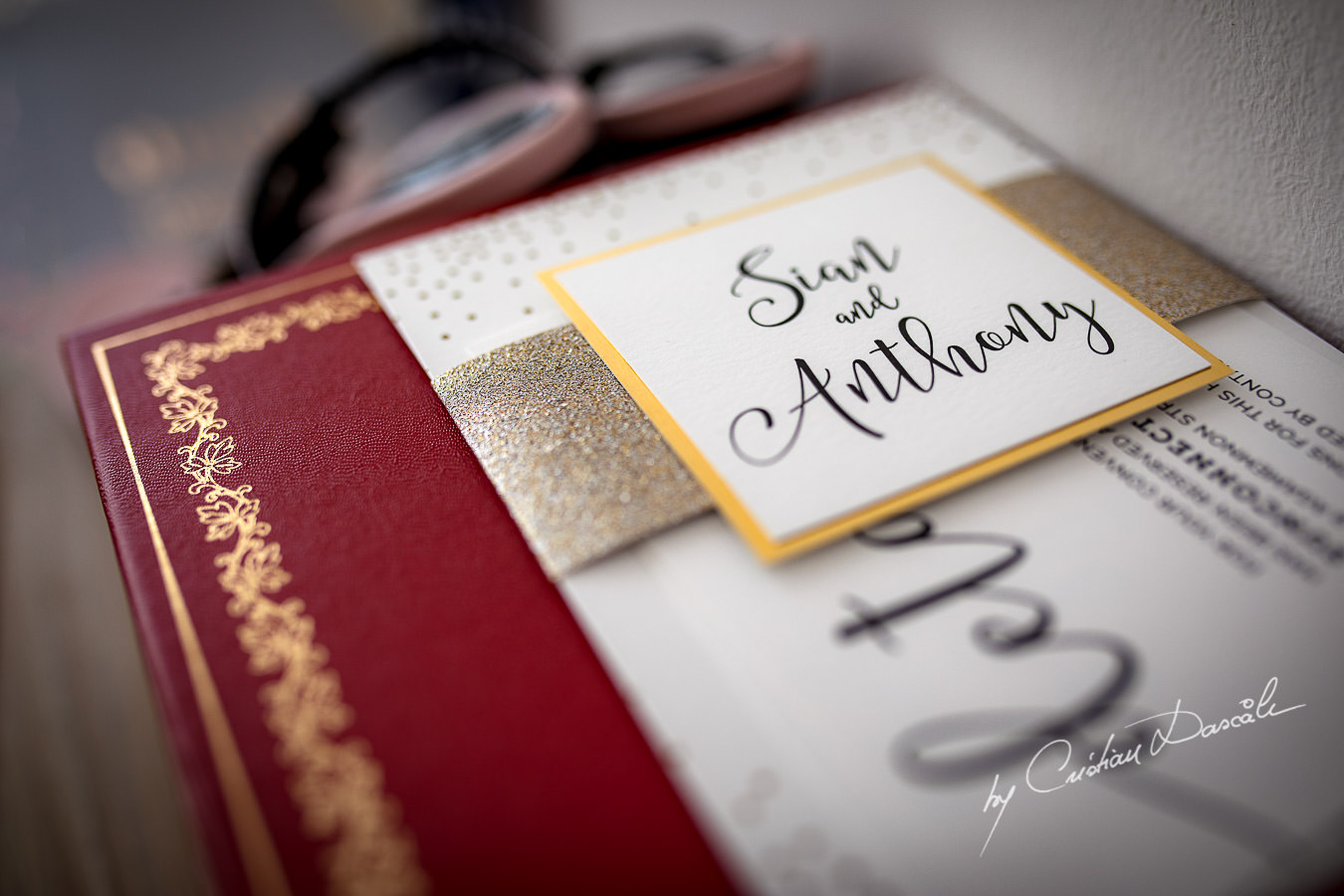 A wedding invitation captured by Cristian Dascalu during an elegant Aphrodite Hills Wedding in Cyprus.