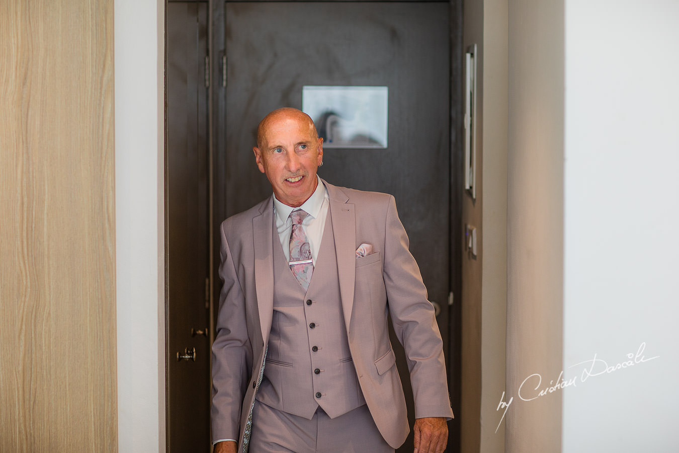 Father of the bride just before meeting the bride, moments captured by Cristian Dascalu during an elegant Aphrodite Hills Wedding in Cyprus.