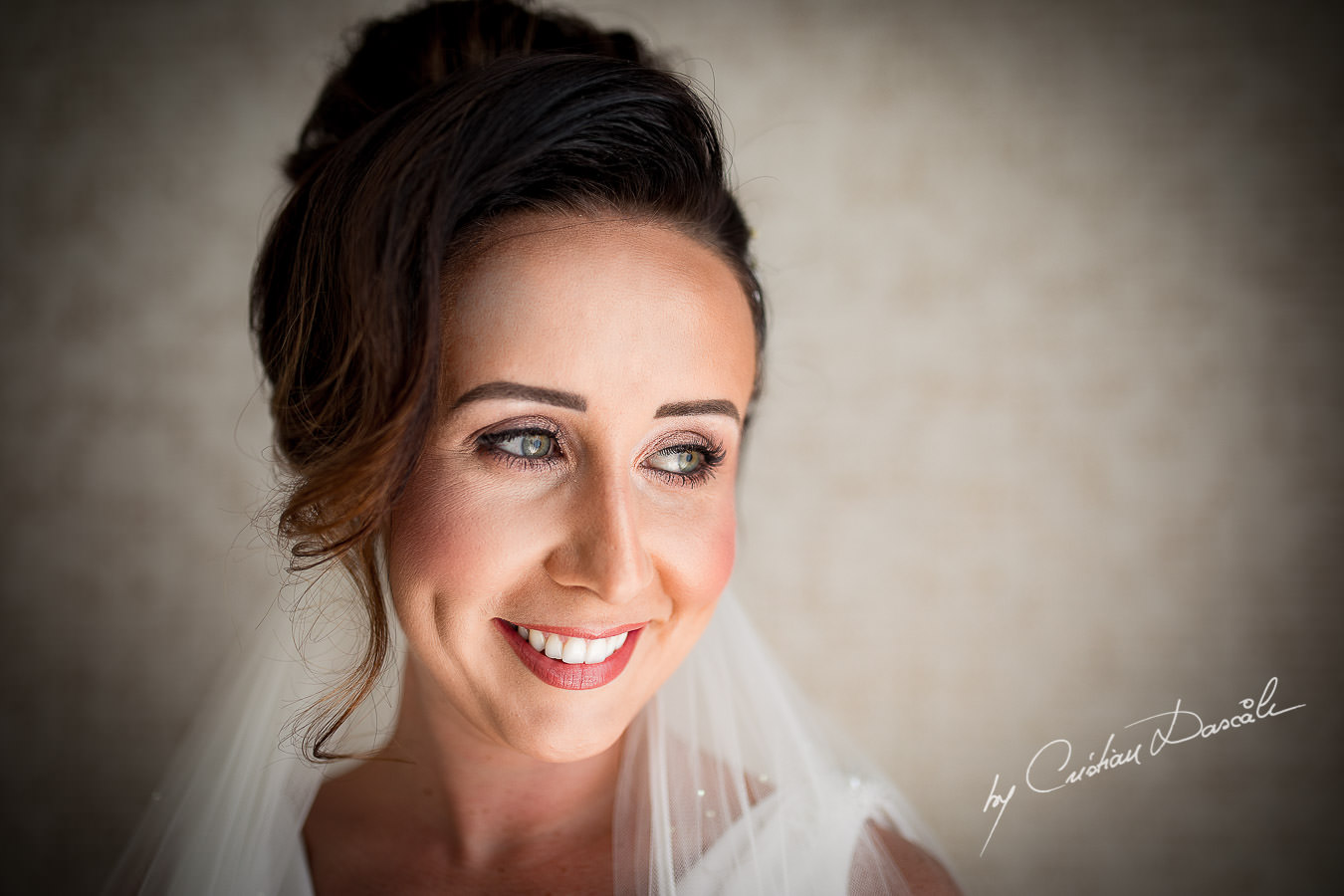 Lovely bridal portrait captured by Cristian Dascalu during an elegant Aphrodite Hills Wedding in Cyprus.