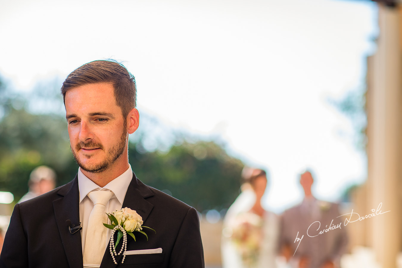 The groom is waiting for his bride, moments captured by Cristian Dascalu during an elegant Aphrodite Hills Wedding in Cyprus.