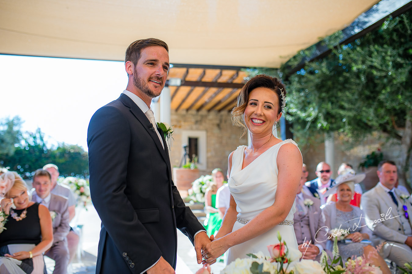 Laughing moments captured by Cristian Dascalu during an elegant Aphrodite Hills Wedding in Cyprus.