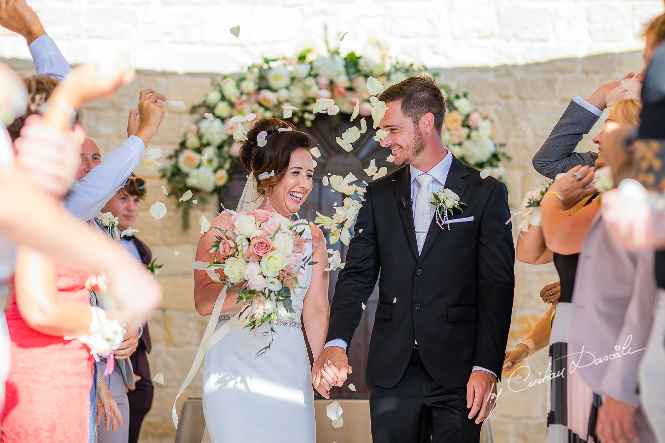 Confetti moments captured by Cristian Dascalu during an elegant Aphrodite Hills Wedding in Cyprus.