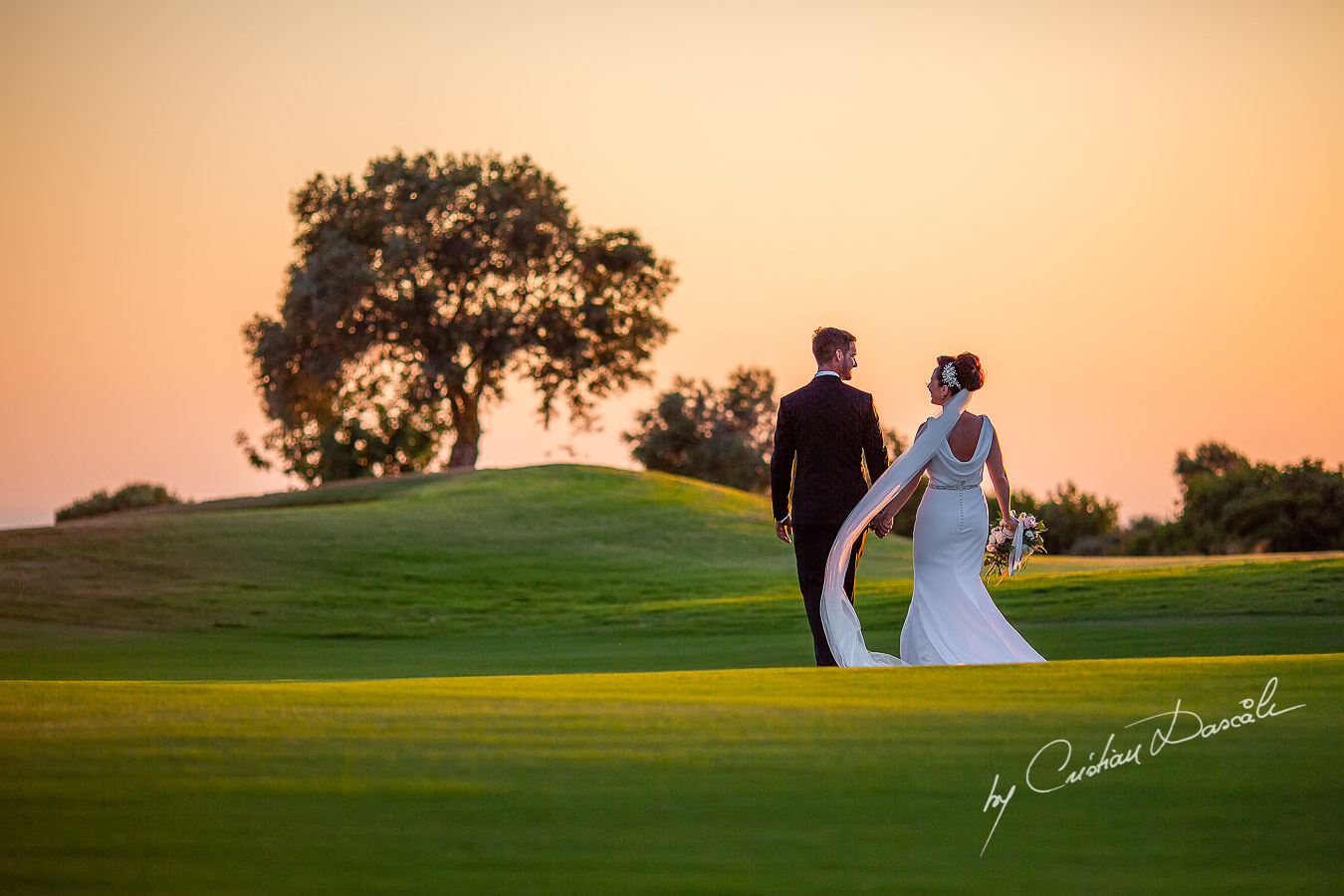 Sunset photo shoot moments captured by Cristian Dascalu during an elegant Aphrodite Hills Wedding in Cyprus.
