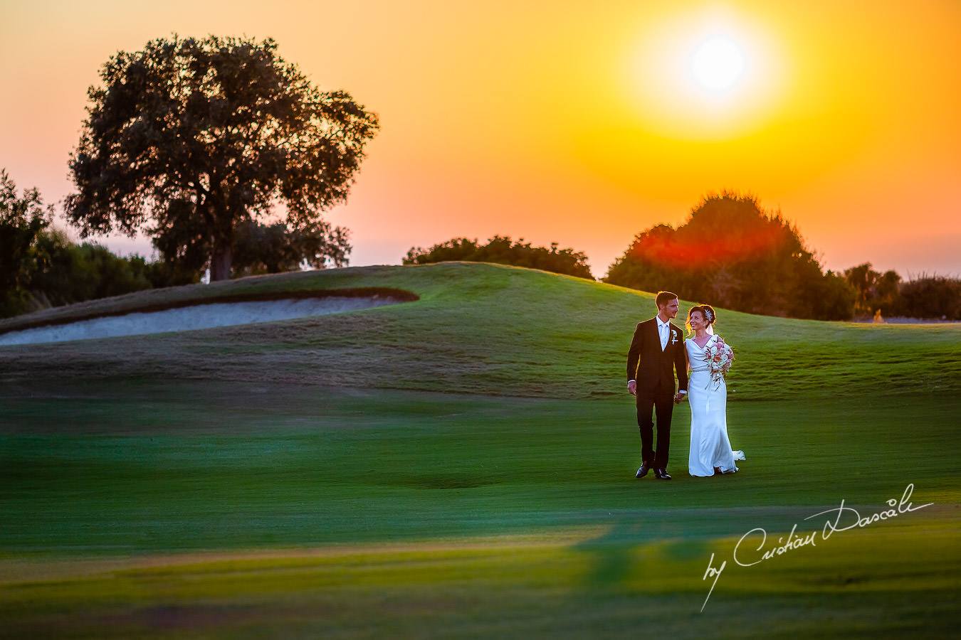 Sunset photo shoot moments captured by Cristian Dascalu during an elegant Aphrodite Hills Wedding in Cyprus.