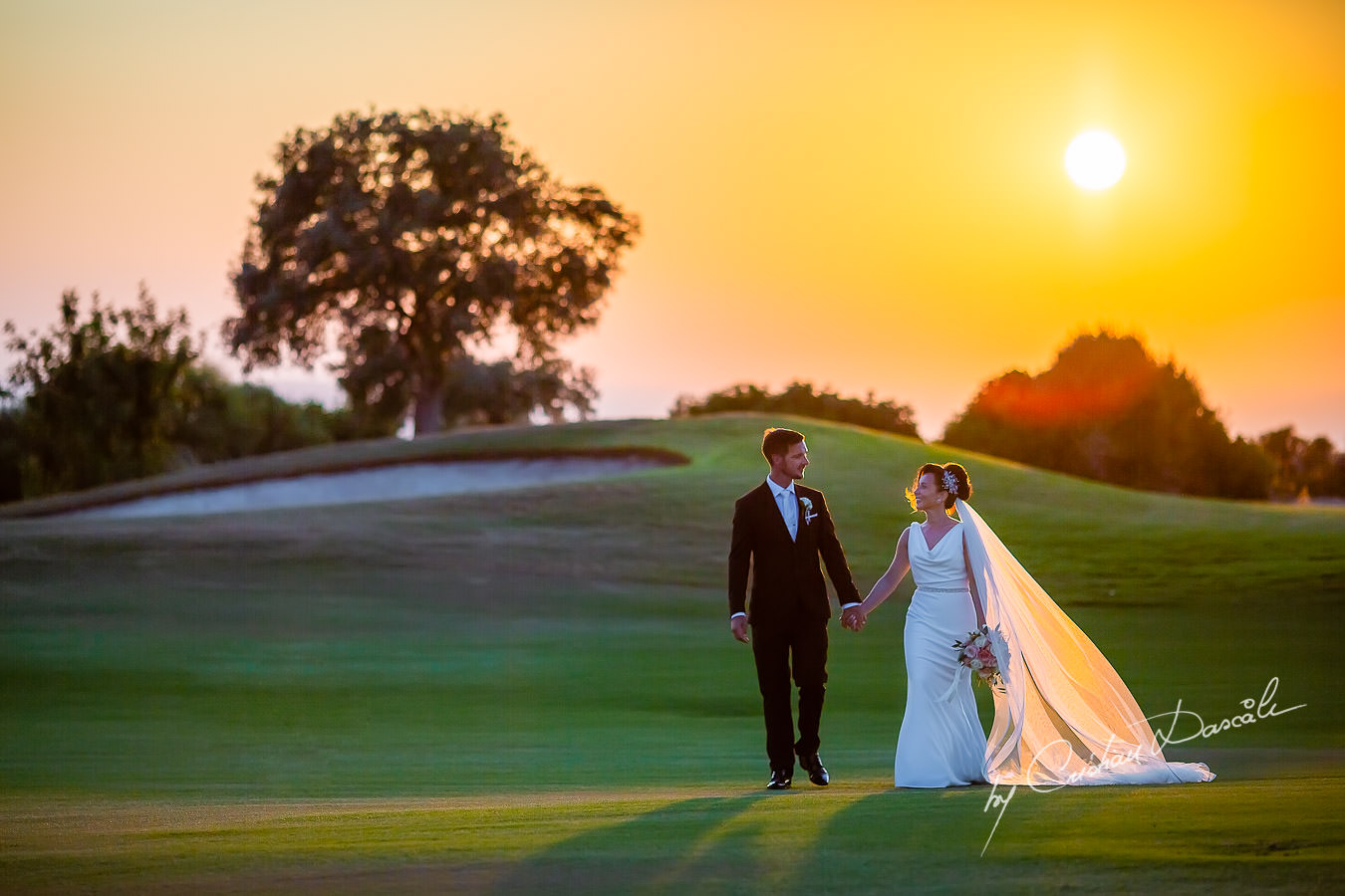 Sunset photo shoot moments captured by Cristian Dascalu during an elegant Aphrodite Hills Wedding in Cyprus.