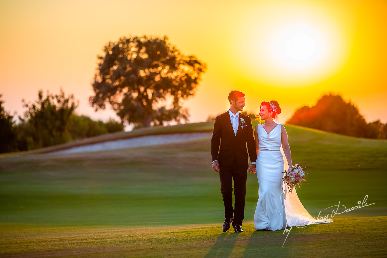 Sunset photo shoot moments captured by Cristian Dascalu during an elegant Aphrodite Hills Wedding in Cyprus.