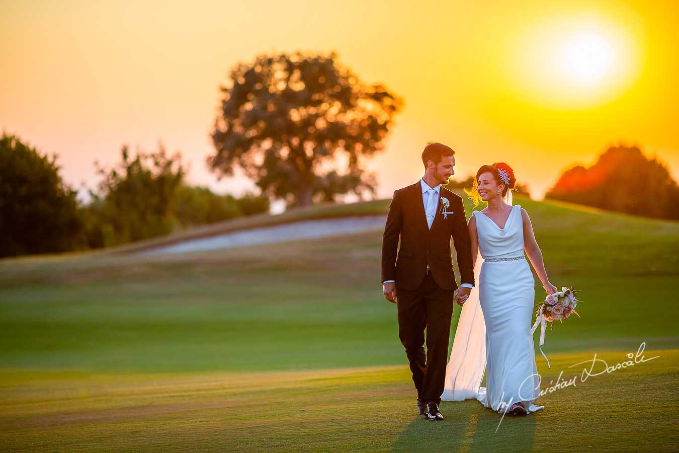 Sunset photo shoot moments captured by Cristian Dascalu during an elegant Aphrodite Hills Wedding in Cyprus.