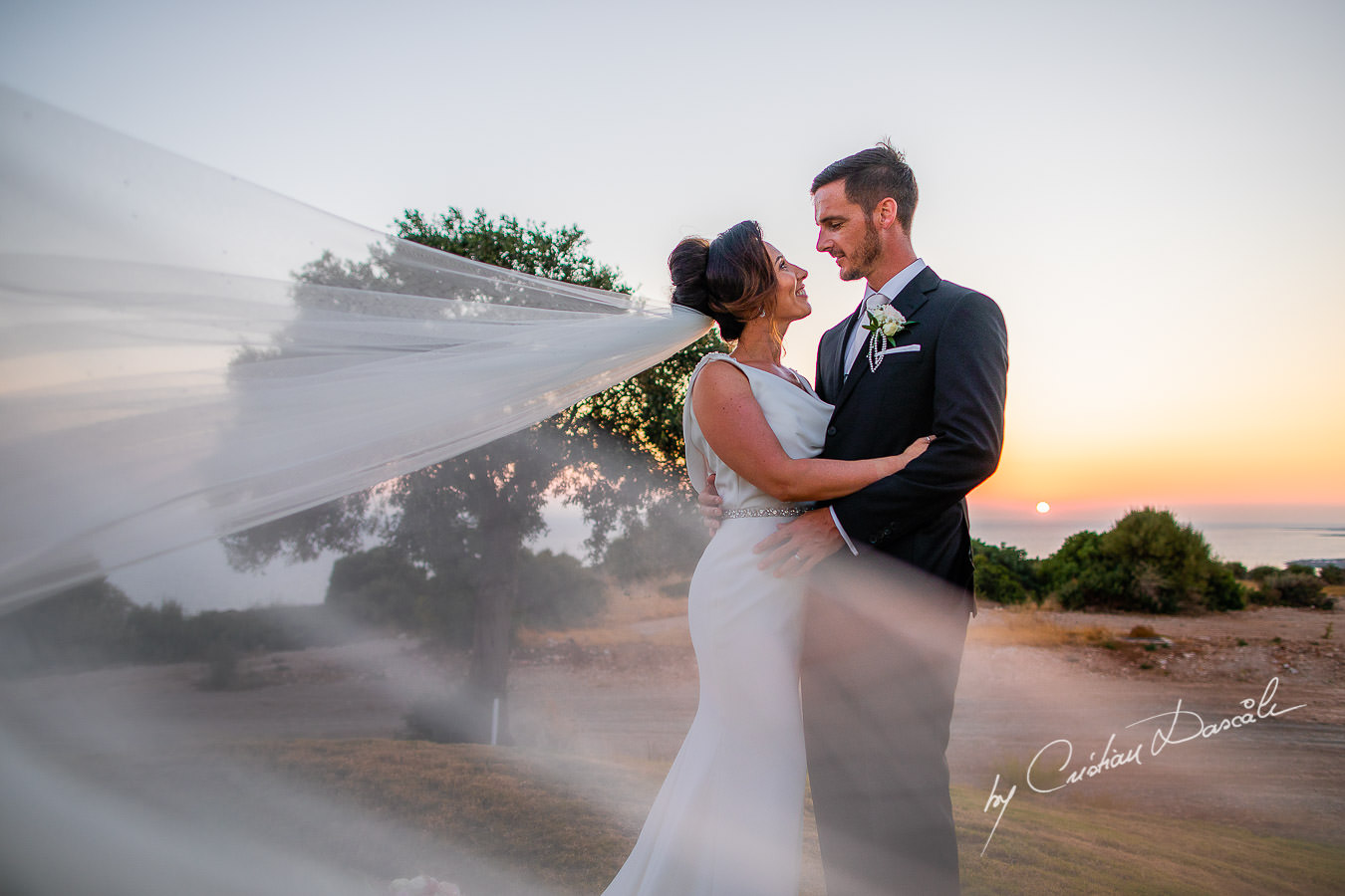 Sunset photo shoot moments captured by Cristian Dascalu during an elegant Aphrodite Hills Wedding in Cyprus.