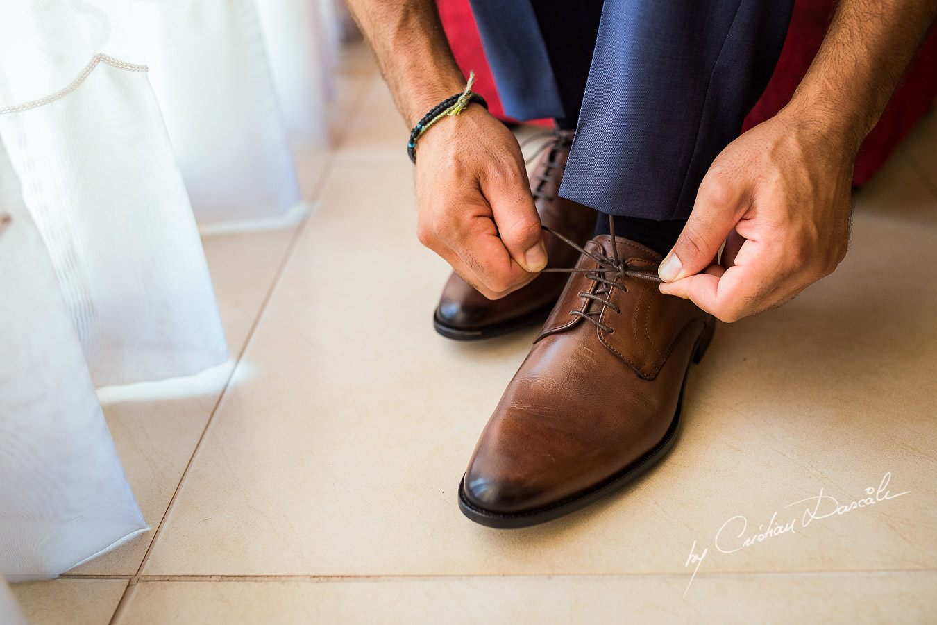 Groom getting ready moments captured by Cyprus Wedding Photographer Cristian Dascalu at a beautiful wedding in Larnaka, Cyprus.