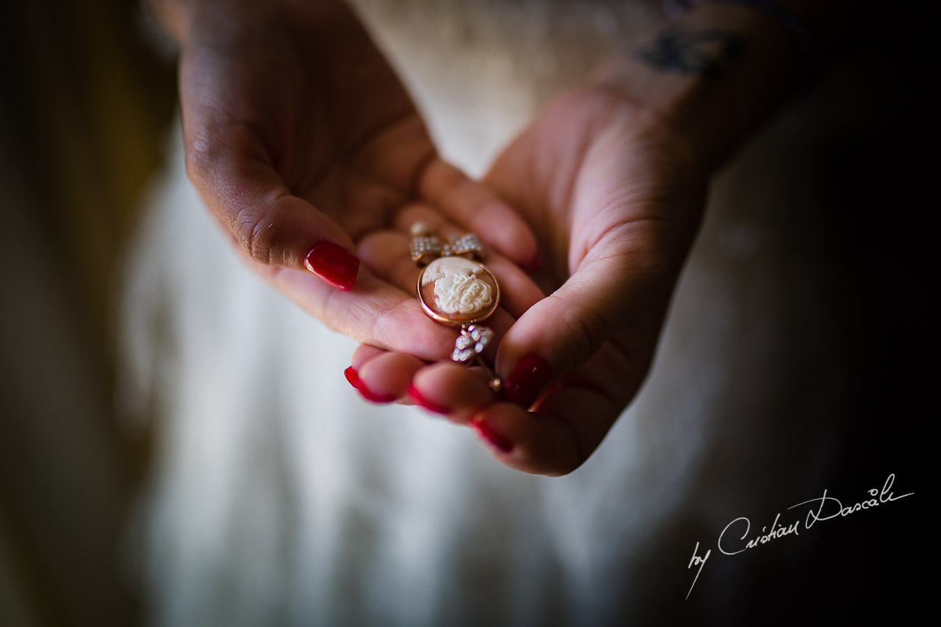 The bride`s earing, captured by Cyprus Wedding Photographer Cristian Dascalu at a beautiful wedding in Larnaka, Cyprus.